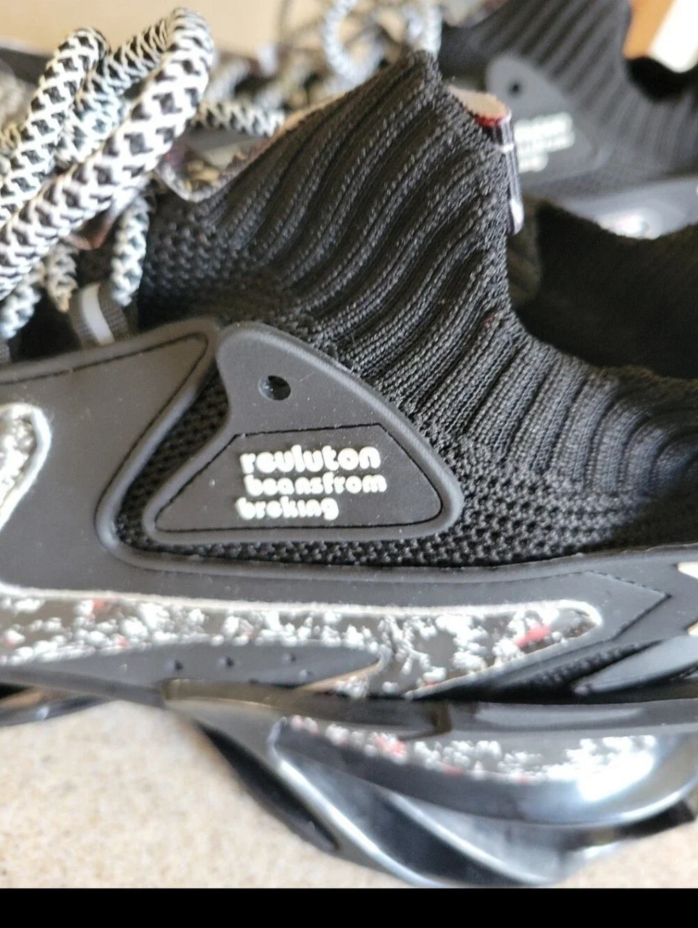 Reuluton Beansfrom Breking Blades Futuristic Looking Sneakers Black Grafiti